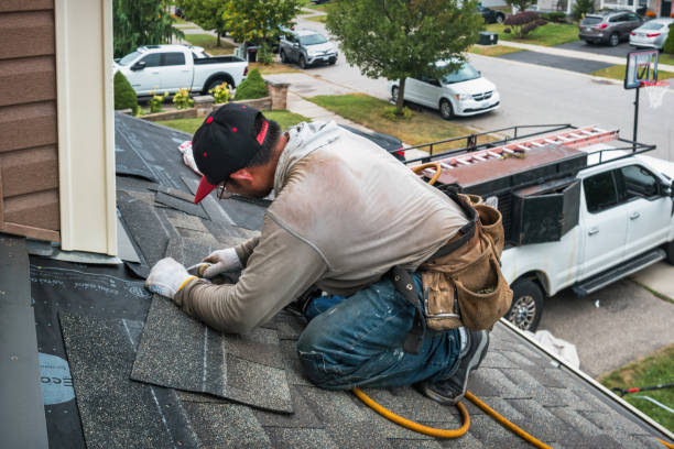 Professional Roofing technician working in Ina, IL